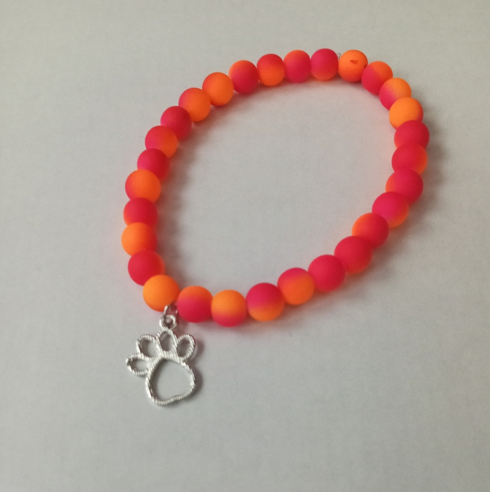 New Neon pink and orange stretchy silver paw print stretchy statement bracelet